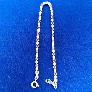 Vintage Avon Gold Plated Red Rhinestone Tennis Bracelet